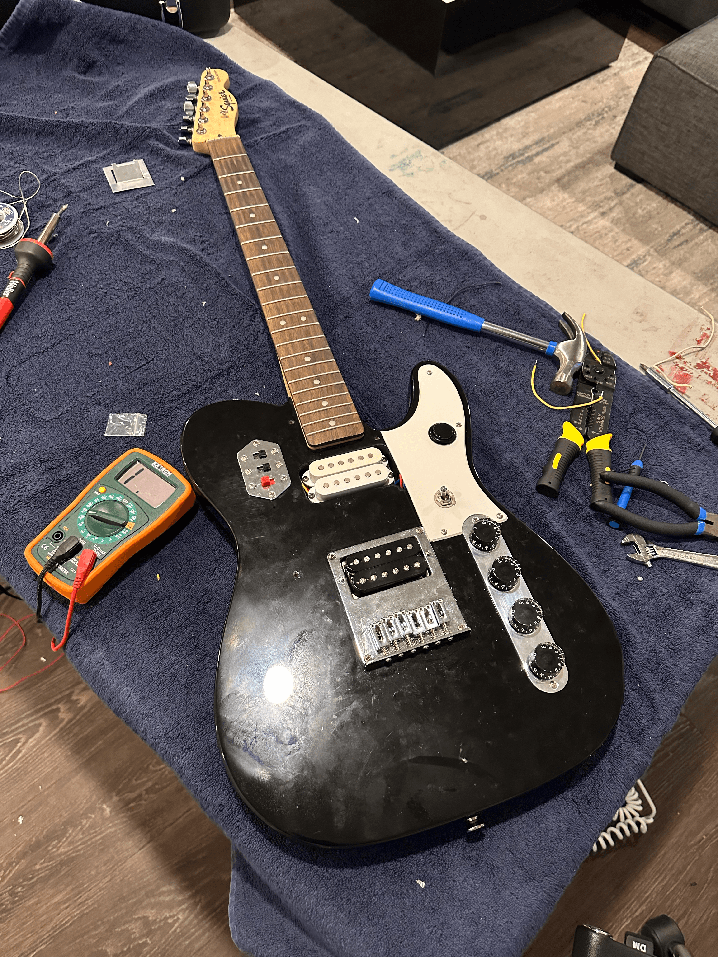 Finished black partscaster on the bench
