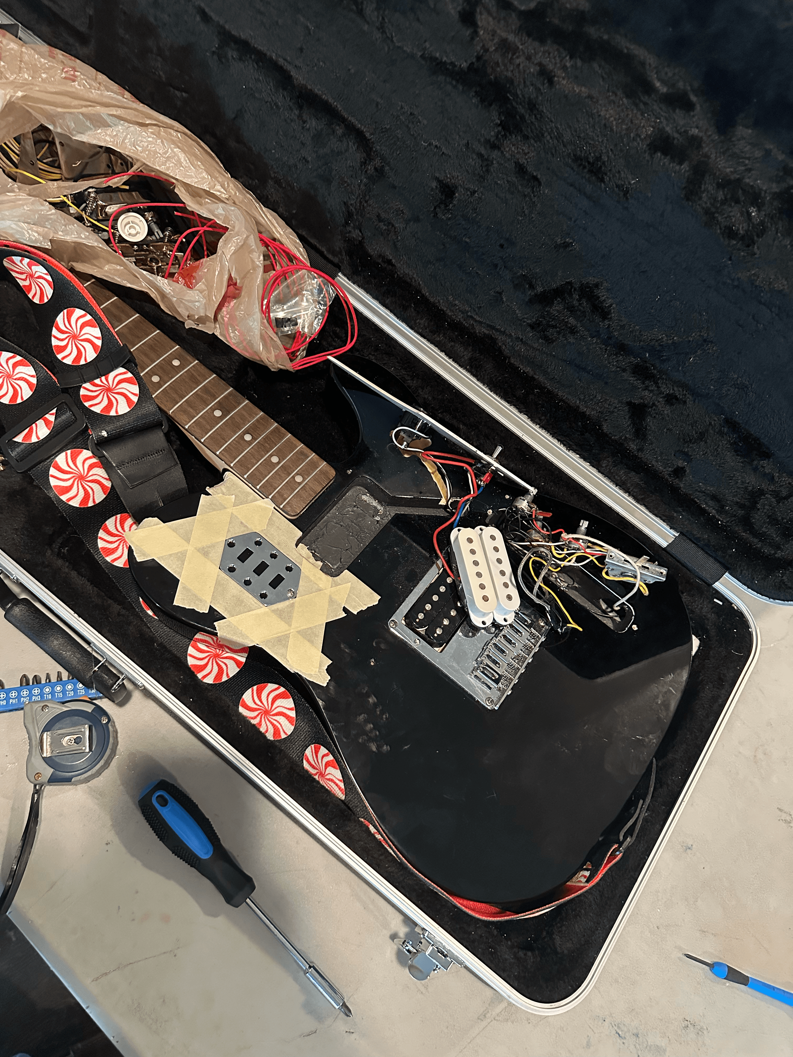 Pickups and wiring laid out on the partscaster body