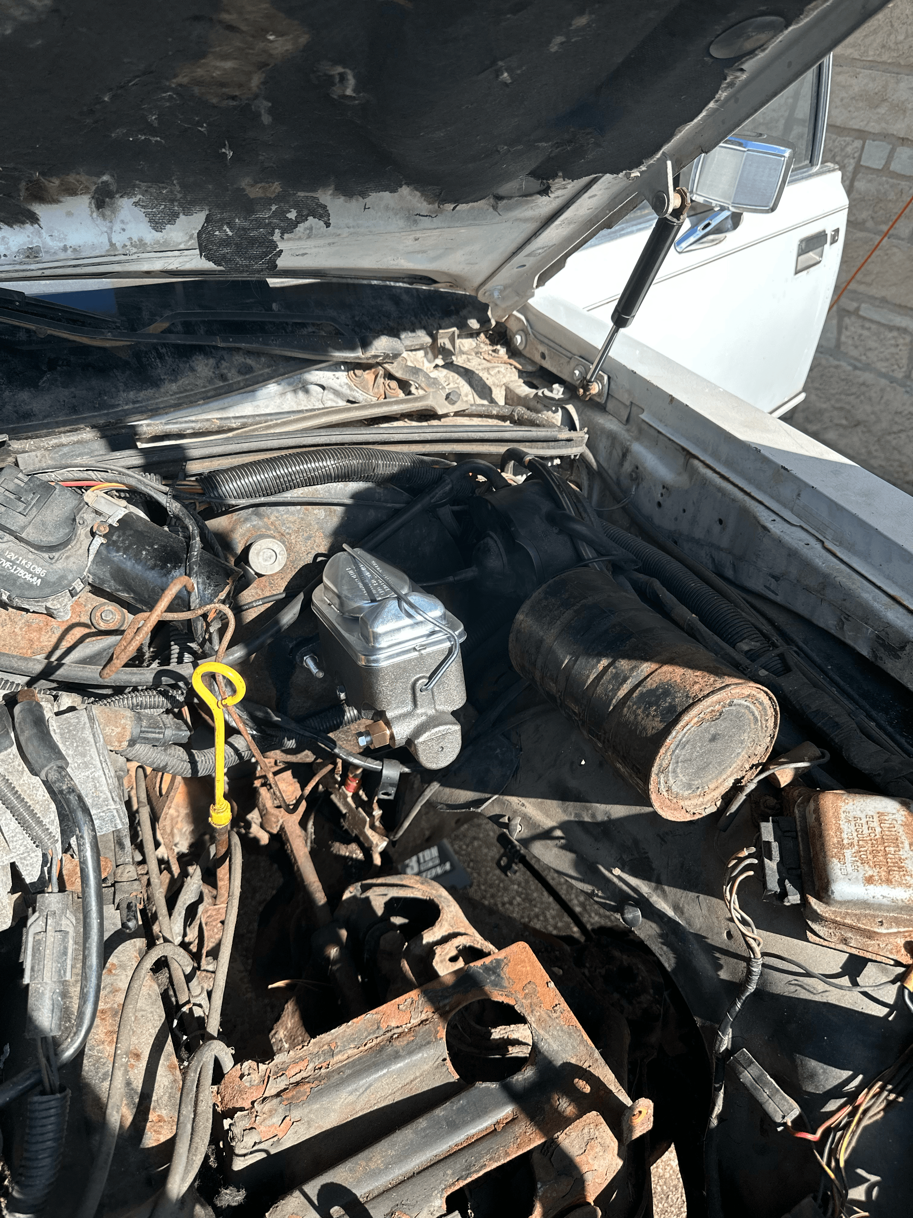 1987 Lincoln Town Car engine bay during revival