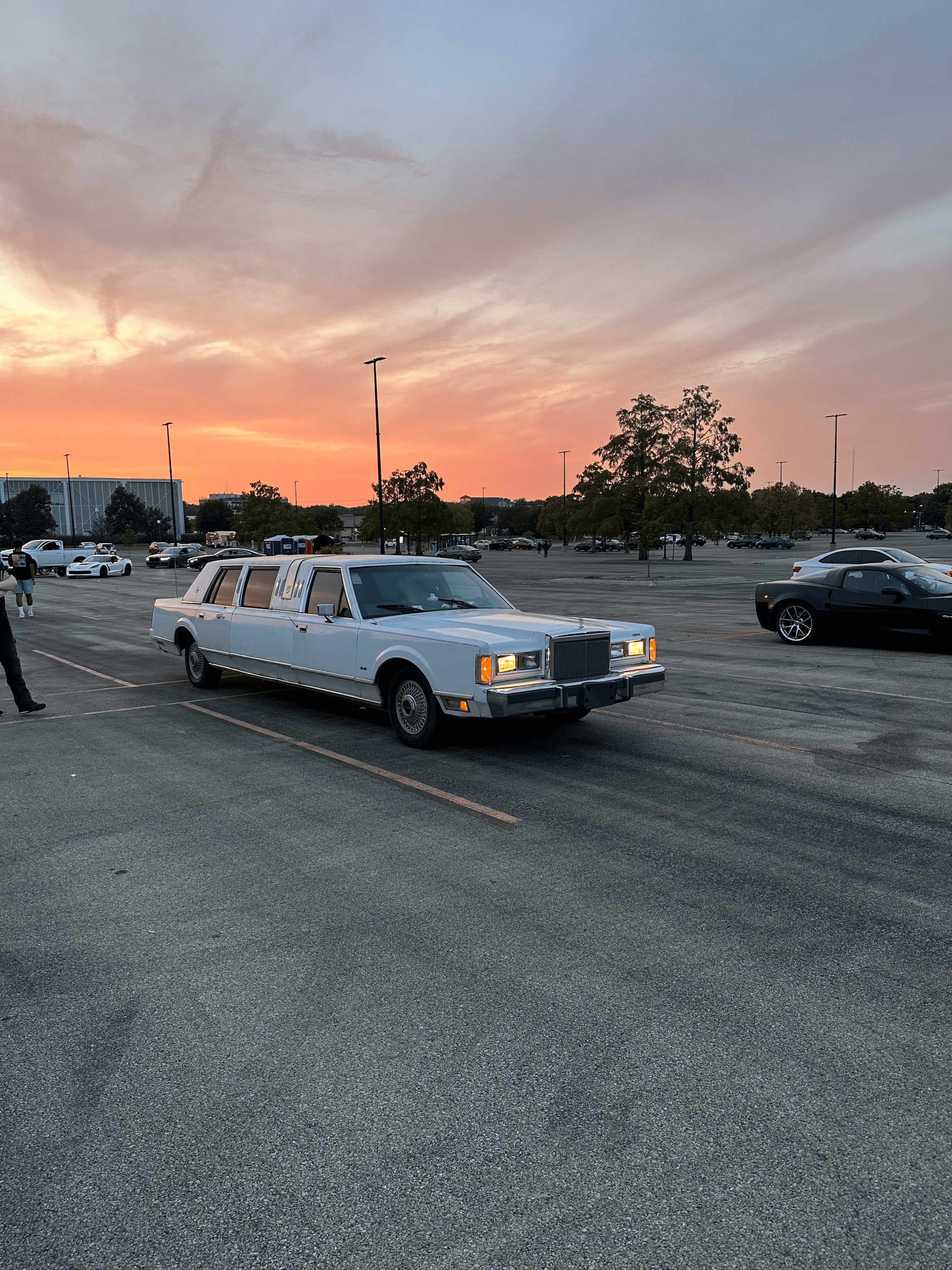 1987 Lincoln Town Car limousine at sunset